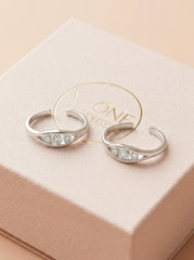White charm silver toerings