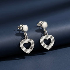 Cupid charm silver earrings