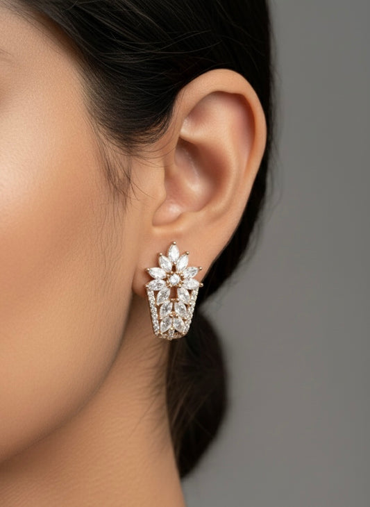 Leaf & light silver stud