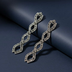 Spiral glow silver earrings