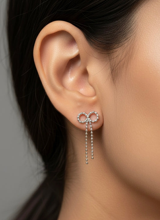 Bow charm silver earrings