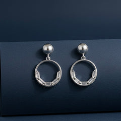 Divya silver earrings