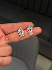 Leaf & light silver stud