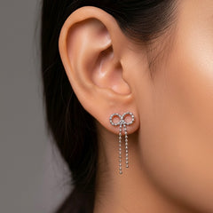 Bow charm silver earrings